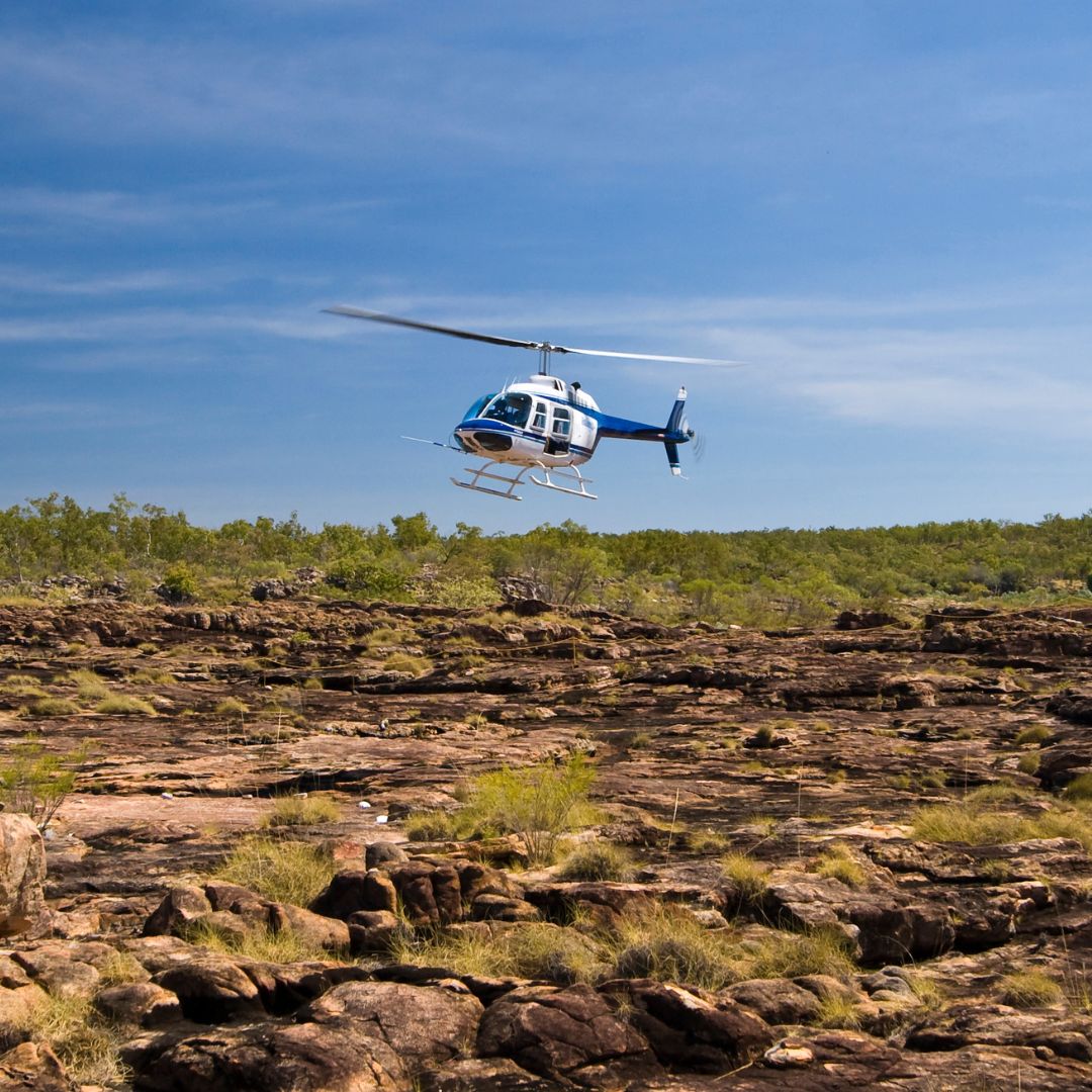 Mitchell Falls Helicopter - Image credit: samvaltenbergs Getty Images Signature Canva Pro