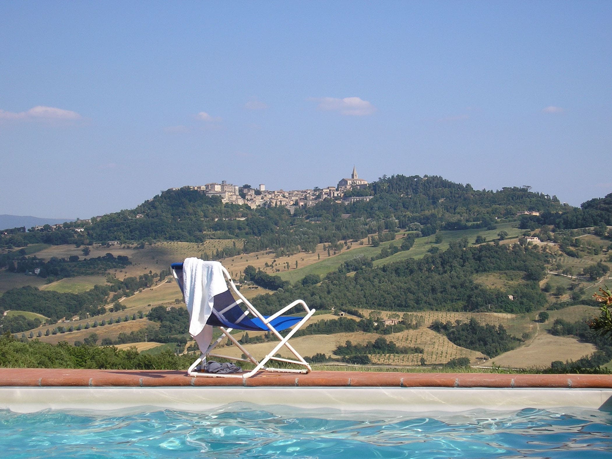Deckchair by the Pool in Todi Italy - Image by Holidays Beckon