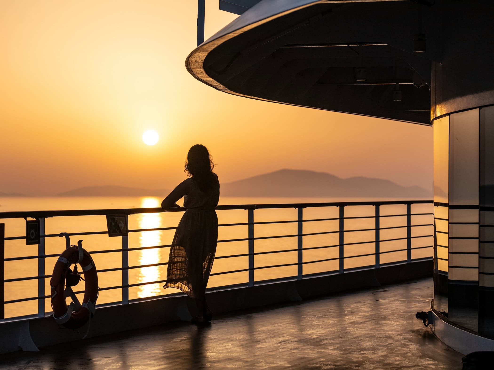 Solo Traveller gazing out to sea