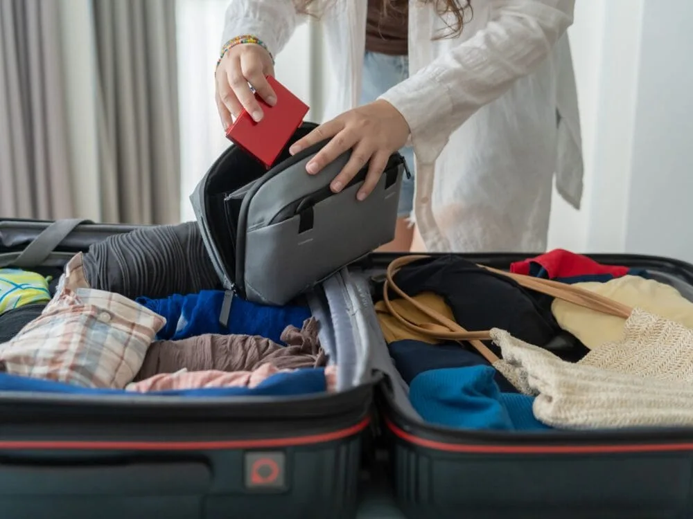 Packing Suitcase by charliepix from charliepix